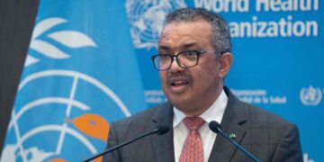 WHO warns against over-reaction to Omicron