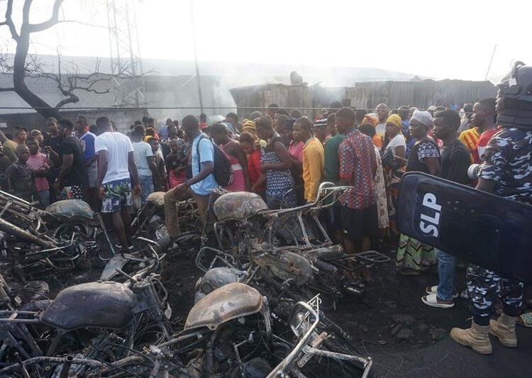 An oil tanker exploded near Sierra Leone's capital, killing at least 92 people and severely injuring dozens of others after large crowds gathered to collect leaking fuel, officials and witnesses said Saturday.