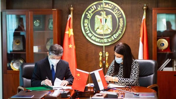 Planning Minister Rania el-Mashaat and Chinese Ambassador here Liao Liqiang signing a new economic and technical co-operation agreement.