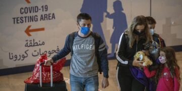 Israel tightens travel restrictions over new COVID variant