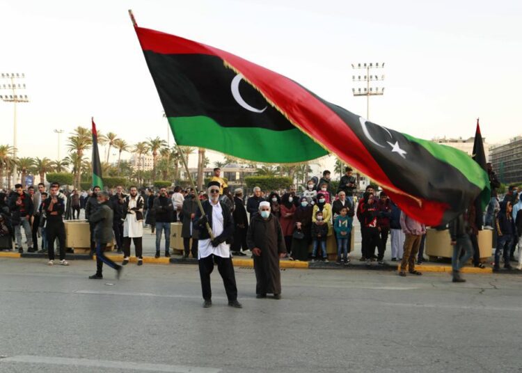 Libyans celebrate the 70th anniversary of their country's independence, despite widespread disappointment over the postponement of the presidential elections, which were scheduled to take place on the same day, in Martyrs' Square, Tripoli, Libya.