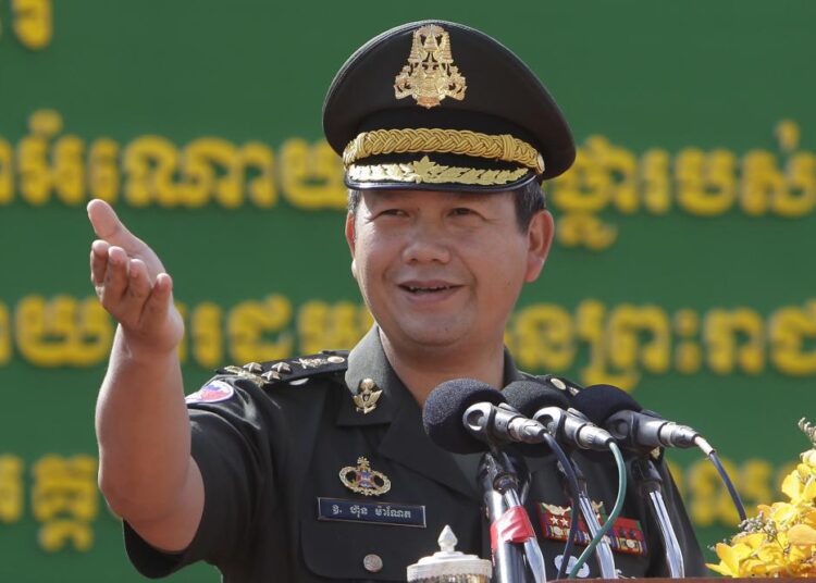 Son of Cambodian Prime Minister Hun Sen, Lt. Gen. Hun Manet delivers a speech while presiding over a military equipment delivery ceremony at the National Olympic Stadium in Phnom Penh, Cambodia, Thursday, June 18, 2020. Cambodia’s long-serving Prime Minister Hun Sen on Thursday, Dec. 2, 2021, explicitly declared his support to have his eldest son, army commander Hun Manet, eventually succeed him as the nation's leader.