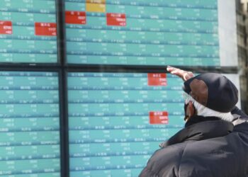 Global stocks fall on virus concern, tighter Fed policy