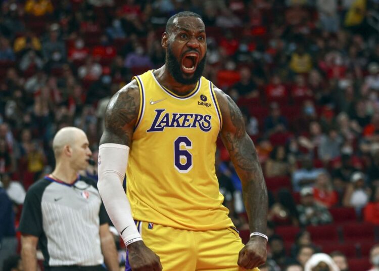 Dec 28, 2021; Houston, Texas, USA; Los Angeles Lakers forward LeBron James (6) reacts after scoring a basket during the fourth quarter against the Houston Rockets at Toyota Center. Mandatory Credit: Troy Taormina-USA TODAY Sports