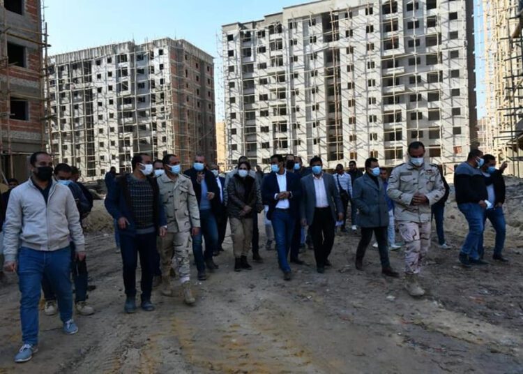 Assistant Prime Minister Randa el-Minshawi inspecting some of the residential buildings being constructed in el-Hawatam area in Fayoum.