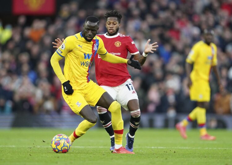 Vieira says African Cup of Nations deserves more respect 1 - Egyptian Gazette Crystal Palace's Cheikhou Kouyate (L) challenges for the ball with Manchester United's Fred during their English Premier League match in Manchester on December 5, 2021.