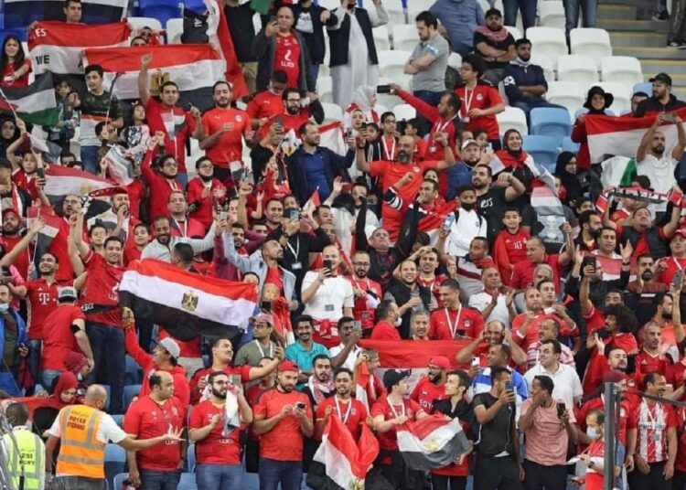 Egypt to take on Tunisia as Algeria to clash with Qatar in Arab Cup semis 1 - Egyptian Gazette Algeria supporters cheer during the FIFA Arab Cup 2021 quarter-final match against Morocco at the Al-Thumama Stadium in the Qatari capital Doha on December 11, 2021..