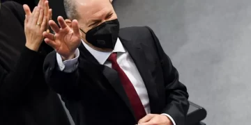 Scholz takes over as German chancellor, ending Merkel era