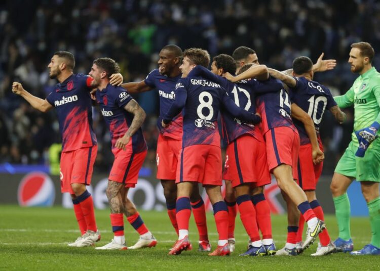 Atletico Madrid players celebrate after the match against Porto at Estadio do Dragao, Porto December 7, 2021.
