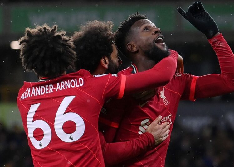 Liverpool’s Divock Origi (R) celebrates with teammates after scoring his side’s goal against Wolves.