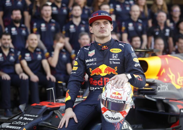 Red Bull’s Max Verstappen poses during a team photo ahead of the Abu Dhabi Grand Prix at the Yas Marina Circuit, Abu Dhabi December 9, 2021.