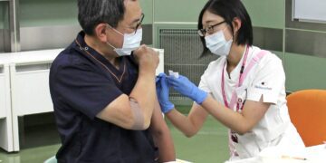 Japan to speed up booster shots amid fear of omicron spread