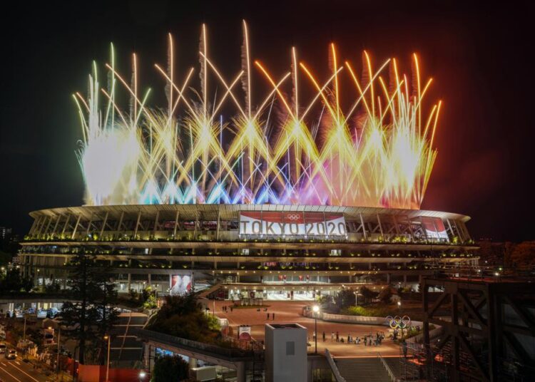 FILE - Fireworks illuminate over National Stadium during the closing ceremony of the 2020 Tokyo Olympics, Aug. 8, 2021, in Tokyo.