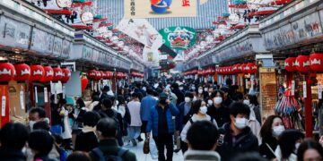 Japan braces for Omicron spread as New Year’s travellers fan across country