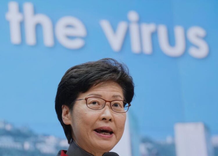 Hong Kong virus cluster in housing prompts partial lockdown 1 - Egyptian Gazette FILE - Hong Kong Chief Executive Carrie Lam speaks during a news conference in Hong Kong, Wednesday, Jan. 5, 2022. Lam announced Tuesday, Jan 25, 2022, that Hong Kong is expanded a partial lockdown and tightened pandemic restrictions after more than 200 cases of COVID-19 were discovered at a public housing estate.