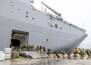 Australia navy ship with infected crew offloads aid to Tonga