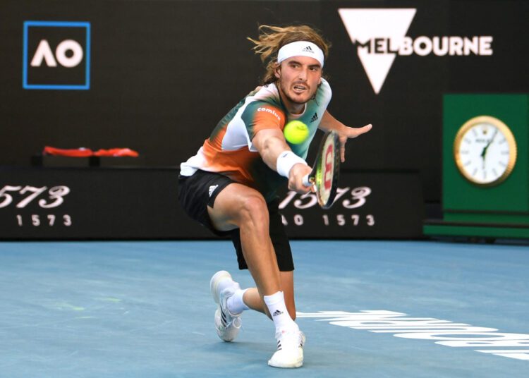 Tennis - Australian Open - Melbourne Park, Melbourne, Australia - January 20, 2022 Greece's Stefanos Tsitsipas in action during his second round match against Argentina's Sebastian Baez REUTERS/Morgan Sette