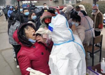 China locks down third city, raising affected to 20 million