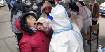 China locks down third city, raising affected to 20 million