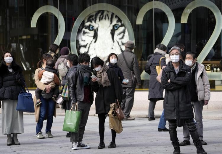 Tokyo recorded its fourth record number of daily COVID-19 infections on Saturday, breaking above 10,000, while Japan's exceeded 50,000 for the first time as the Omicron variant continues to spread rapidly.