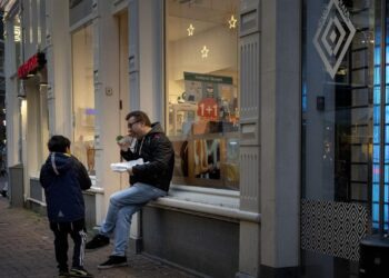 In southern Dutch town, cafes open in lockdown protest