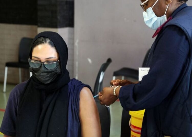 S. African study suggests Omicron less severe even for unvaccinated 1 - Egyptian Gazette A healthcare worker administers the coronavirus disease (COVID-19) vaccine to a pregnant woman, amidst the spread of the SARS-CoV-2 variant Omicron, in Johannesburg, South Africa, December 9, 2021.