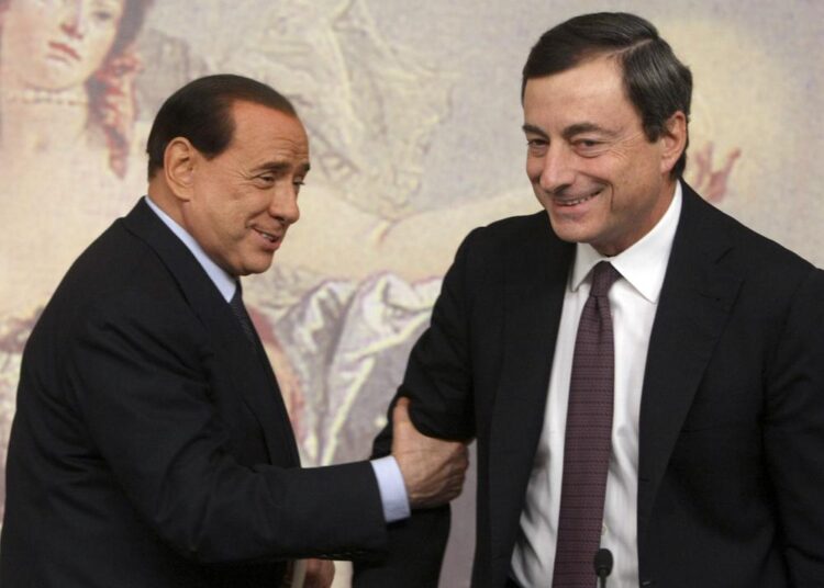 A file photo showing former and present Italian Premiers Silvio Berlusconi, (L), and Mario Draghi, are seen during a press conference at Chigi Palace,in Rome.