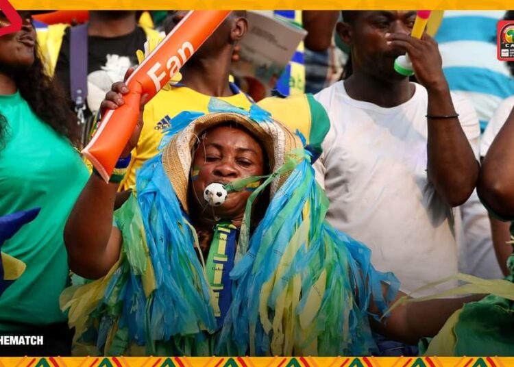 Tunisia and Burkina Faso reach AFCON last 8 1 - Egyptian Gazette A Nigerian supporter cheers prior to the African Cup of Nations last-16 match against Tunisia.