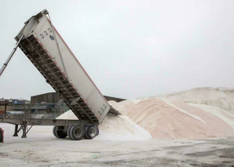 Thousands of flights canceled as Eastern US braces for winter storm 1 - Egyptian Gazette A truck delivers road salt in preparation for a winter storm at the Boston Public Works Department yard on January 28, 2022