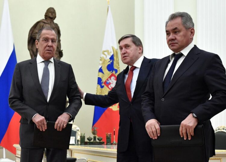 A file photo of Russian Foreign Minister Sergey Lavrov (L) presidential aide Yury Ushakov (C) and Defence Minister Sergei Shoigu wait for the beginning of the Russia-Turkey talks in the Kremlin in Moscow.