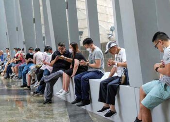 Hong Kong ramps up virus controls, bans flights from eight countries