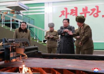 N.Korea confirms latest weapons tests as Kim visits key munitions factory