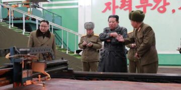 N.Korea confirms latest weapons tests as Kim visits key munitions factory