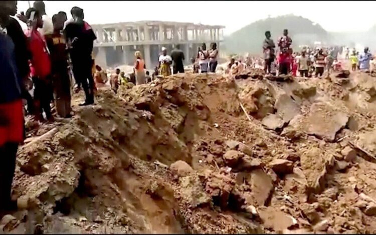 At least 17 people were killed and scores injured when a truck carrying explosives to a gold mine in western Ghana collided with a motorcycle, setting off an explosion that flattened a rural community, the government said on Friday.