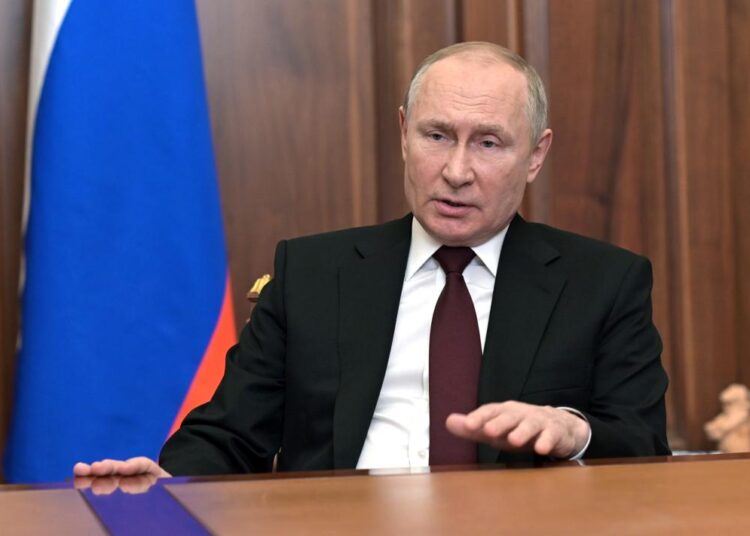 Russian President Vladimir Putin addresses the nation in the Kremlin in Moscow, Russia, Monday
