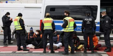 Group of 11 climate activists glue themselves to Berlin motorway