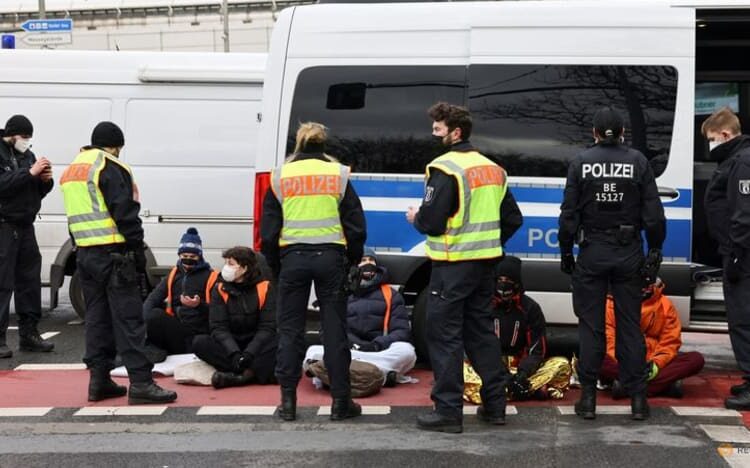 Group of 11 climate activists glue themselves to Berlin motorway 1 - Egyptian Gazette