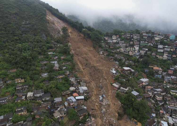 Brazil mudslides kill at least 94, with dozens still missing 1 - Egyptian Gazette An aerial view shows neighborhood affected by landslides in Petropolis, Brazil, Wednesday, Feb. 16, 2022. Heavy rains set off mudslides and floods in a mountainous region of Rio de Janeiro state, killing multiple people, authorities reported.