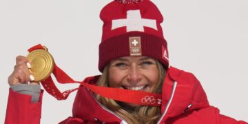 Corinne Suter wins Olympic downhill gold