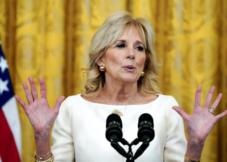 Jill Biden turns Valentine’s Day into lesson for 2nd graders 1 - Egyptian Gazette First lady Jill Biden speaks during a "Cancer Moonshot" event in the East Room of the White House, Wednesday, Feb. 2, 2022, in Washington. Biden has turned Valentine's Day into a lesson for second graders. The first lady and longtime teacher had Washington elementary school students design Valentine's Day hearts that are hanging in the East Wing of the White House. Twenty second graders from Aiton Elementary School and their teacher, Alejandro Diasgranados, will tour the White House on Monday, Feb. 14 and see their “heart work” on display, her office said.