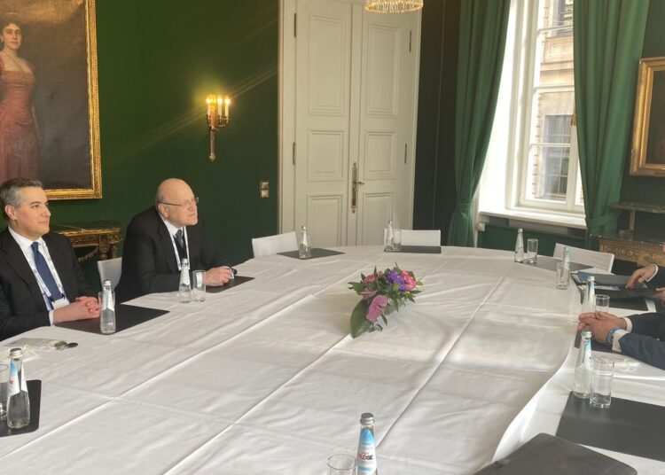 Egyptian Foreign Minister Sameh Shoukry (R) during a meeting Saturday with Lebanese Prime Minister Najib Mikari on the fringe of the Munich Security Conference.