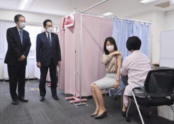 Japan mulls easing COVID border controls amid criticism