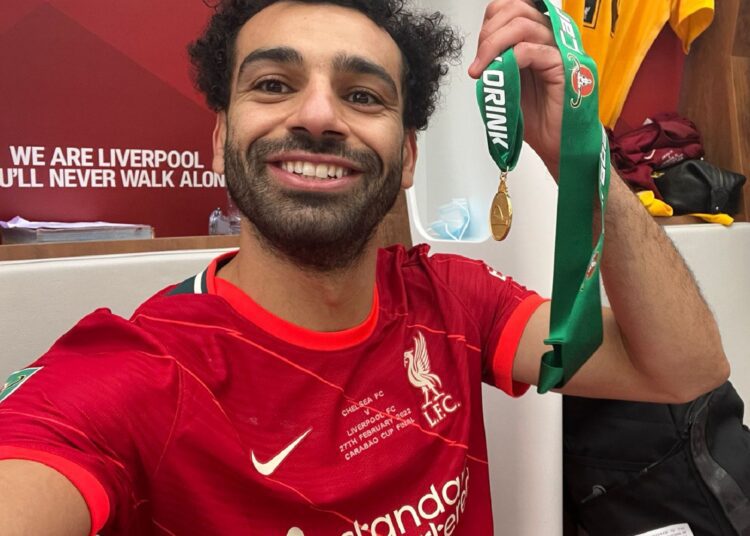 Egyptian star Mohamed Salah celebrated after winning the English League Cup with Liverpool.