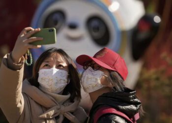 China locks down southern city as omicron surges