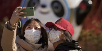 China locks down southern city as omicron surges