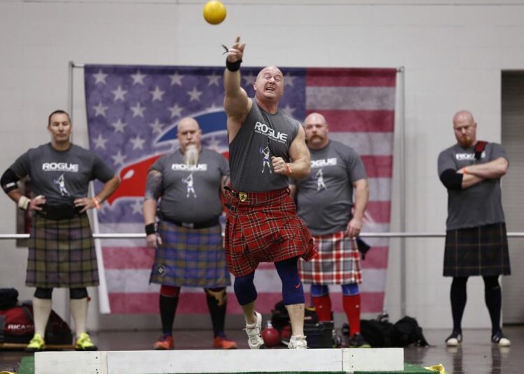 Mark Wechter tosses a shot put in the open stone category during the Arnold Sports Festival’s highland games inside the Greater Columbus Convention Center on March 2, 2018, in Columbus, Ohio.