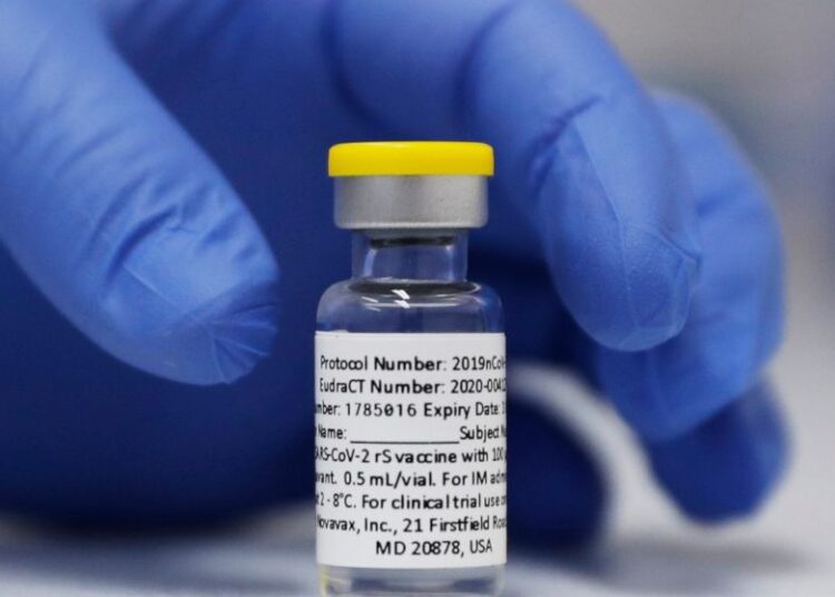 A vial of the Phase 3 Novavax coronavirus vaccine prepared for use in a trial at St. George's University hospital in London on Oct. 7, 2020.