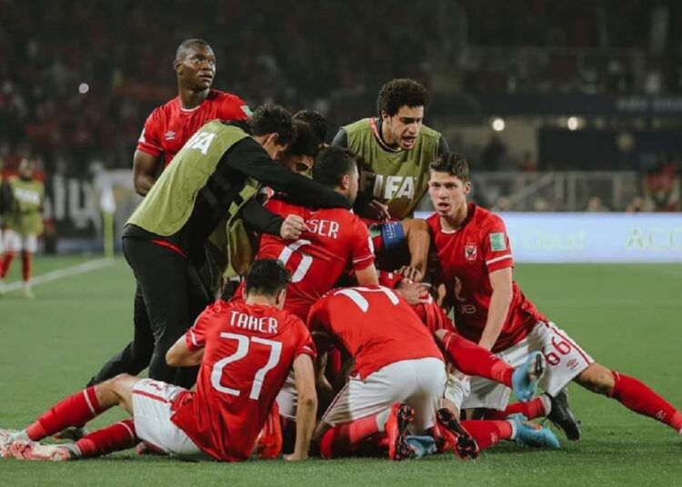 Egypt's Al-Ahly players celebrate after Mohamed Hani scored the opening goal during the 2021 FIFA Club World Cup match against Mexico's Monterrey at al-Nahyan Stadium in Abu Dhabi.