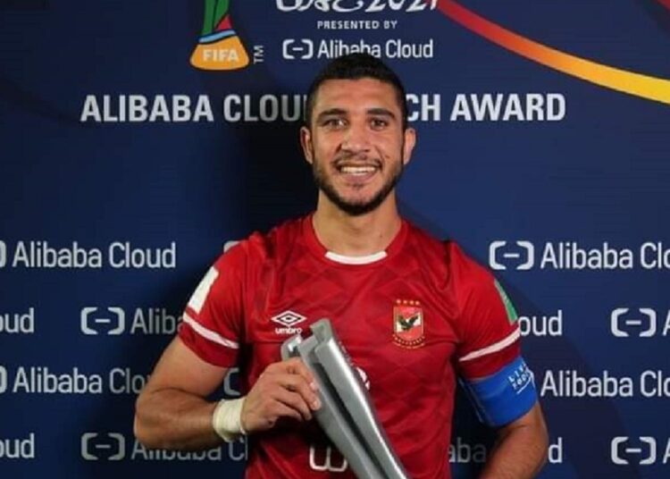 Al-Ahly's captain Rami Rabia poses with the man of the match trophy after FIFA Club World Cup match against Mexico’s Monterrey.
