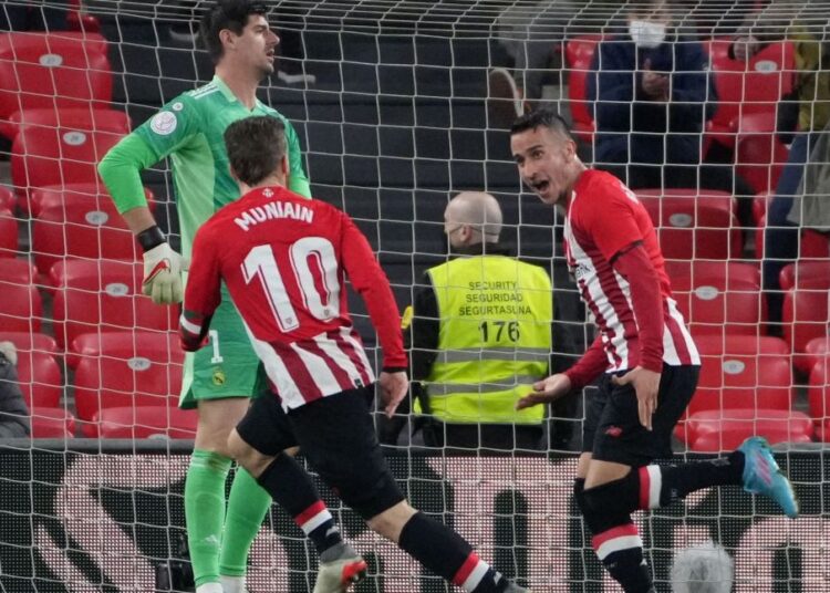 Athletic Bilbao’s players celebrate after scoring a stunning last-minute strike by substitute Alex Berenguer.